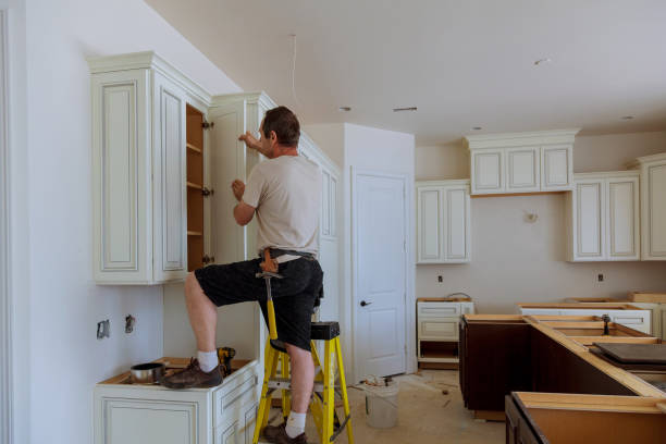 Open concept kitchen conversion in Lonsdale by JMT Kitchen Cabinet